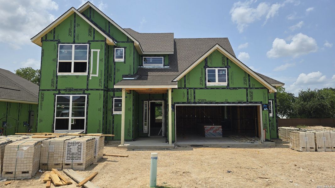 In-progress construction of a new home in Village at Three Oaks, Seguin, TX (Image 14).