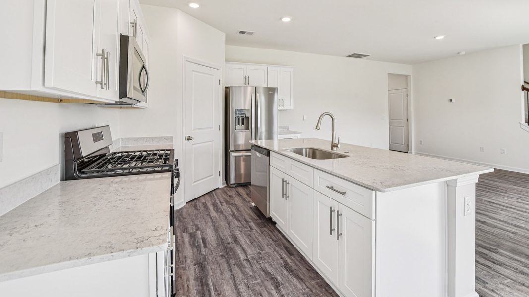 Representative furnished interior of a home built from the Craig by D.R. Horton in The Hideaway at Fox Meadows, Bluff City (Image 7).