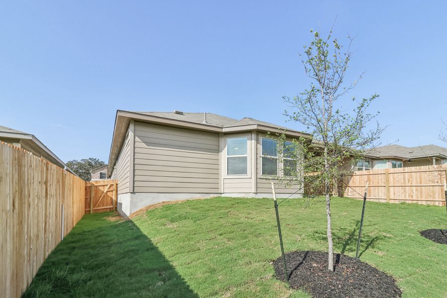 Back exterior of the Hughes floorplan at a Meritage Homes community.