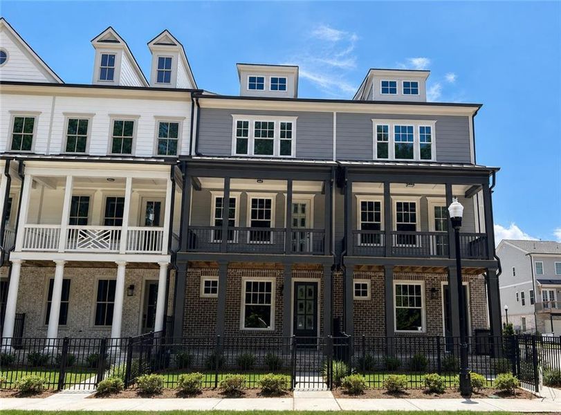 Front exterior of a new home in , Kennesaw, GA, highlighting curb appeal (Image 1). Front exterior of a new home in , Kennesaw, GA, highlighting curb appeal (Image 1).