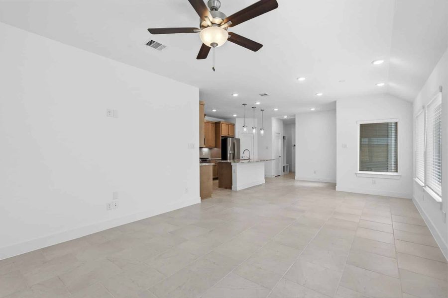 Spacious, unfurnished interior of a new home in Meridiana, Manvel (Image 26).