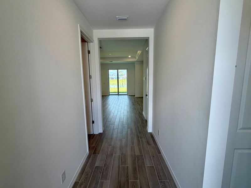 Representative unfurnished interior of a home built from the Juno by William Ryan Homes in The Sanctuary – Resort Collection, Punta Gorda (Image 15).