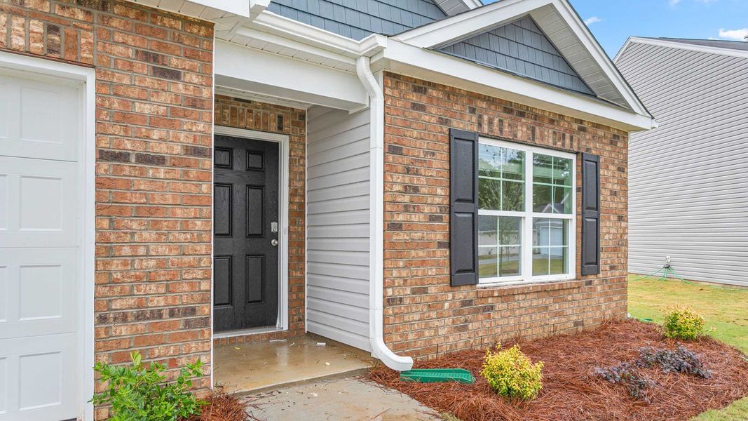 Exterior details and patio area of a home in Greystone North, Stoneville (Image 2). Exterior details and patio area of a home in Greystone North, Stoneville (Image 2).