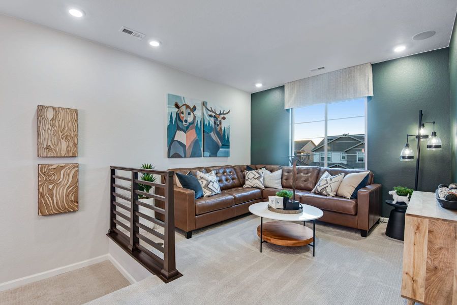 Furnished interior view inside a new home in Reunion, Commerce City (Image 18).