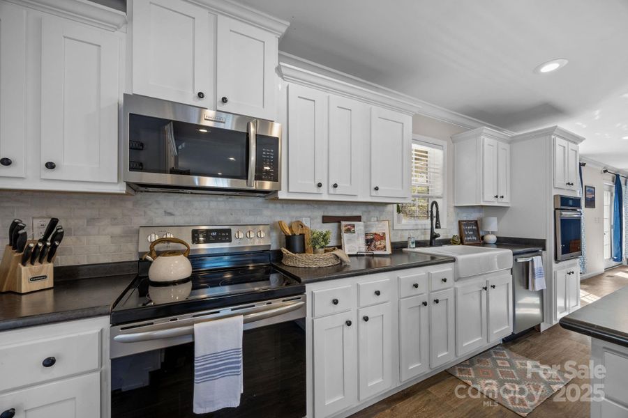 Furnished interior view inside a new home in , Waynesville (Image 9).