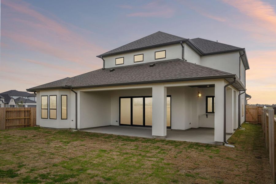 Exterior details and patio area of a home in Del Bello Lakes 60', Manvel (Image 31).