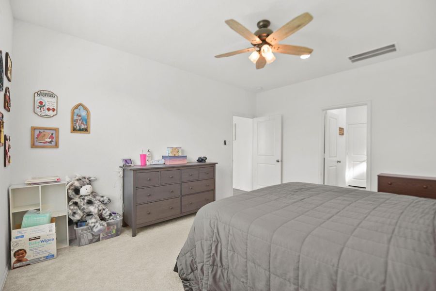 Furnished interior view inside a new home in , Conroe (Image 29).
