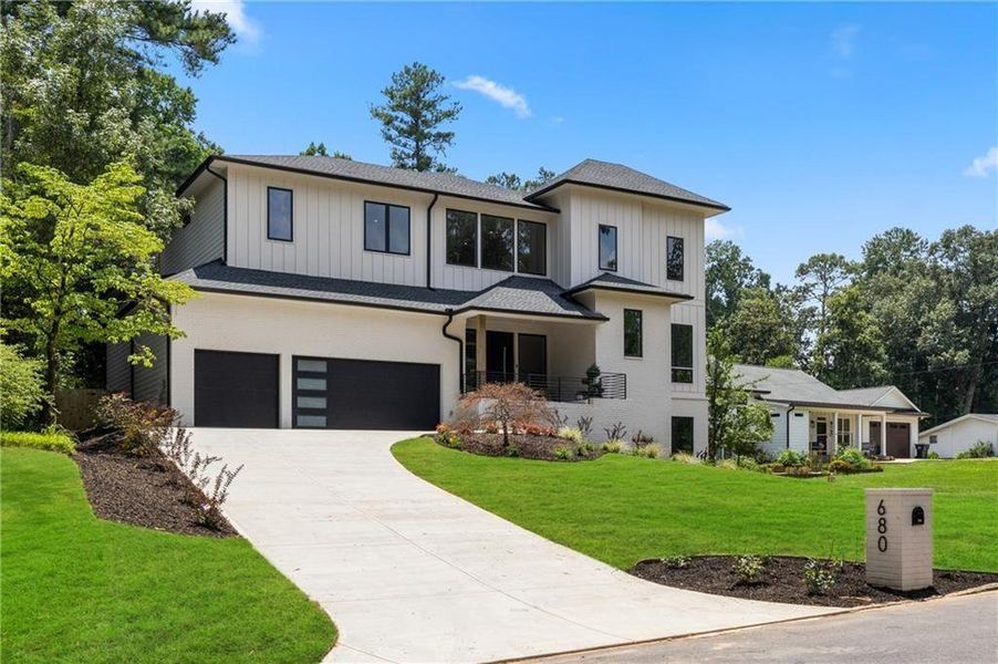 Front exterior of a new home in , Sandy Springs, GA, highlighting curb appeal (Image 25).