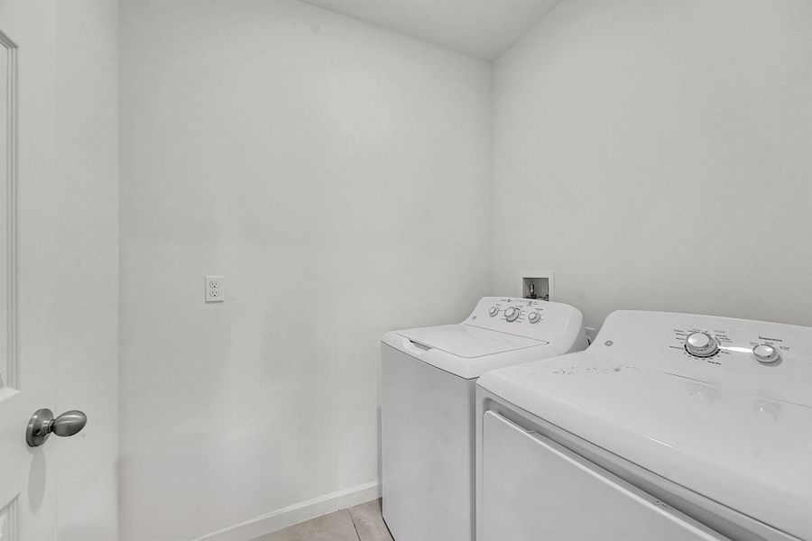 Furnished interior view inside a new home in , Port St. Lucie (Image 10).