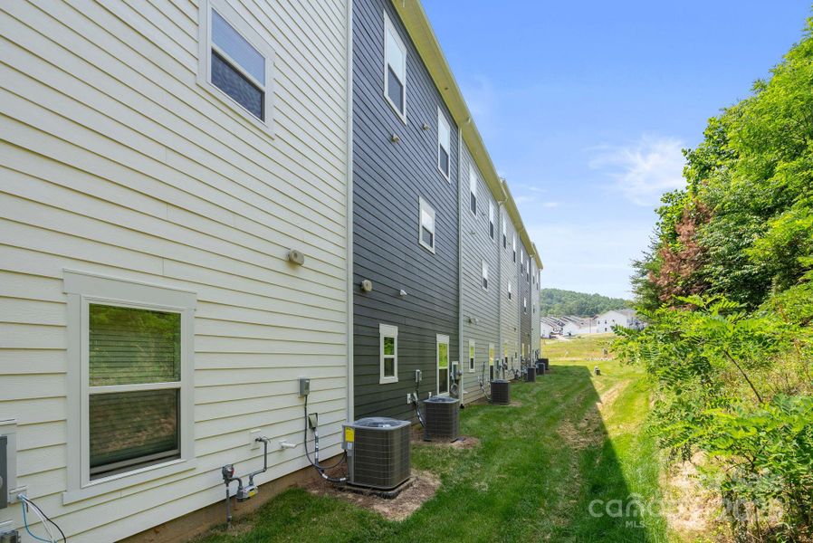 Exterior details and patio area of a home in , Asheville (Image 3).