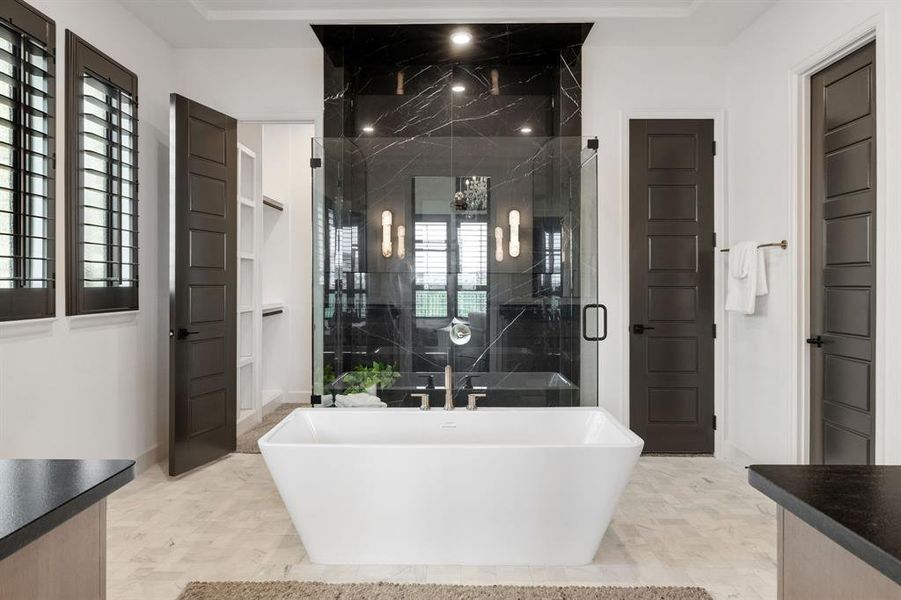 Bathroom with vanity, a marble finish shower, and a soaking tub Bathroom with vanity, a marble finish shower, and a soaking tub