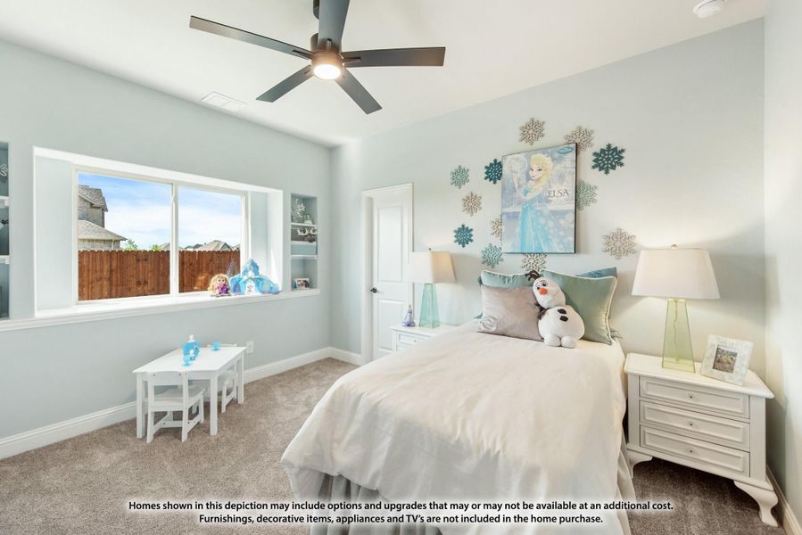 Children's bedroom with carpet, ceiling fan, built-in shelves, and Frozen-themed wall decor Children's bedroom with carpet, ceiling fan, built-in shelves, and Frozen-themed wall decor