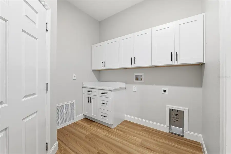 Furnished interior view inside a new home in , Webster (Image 10).