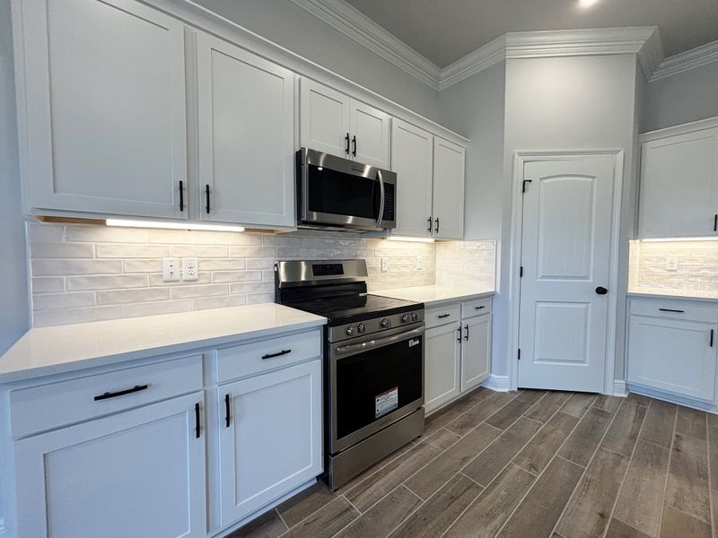 Furnished interior view inside a new home in Natureview, Freeport (Image 7).