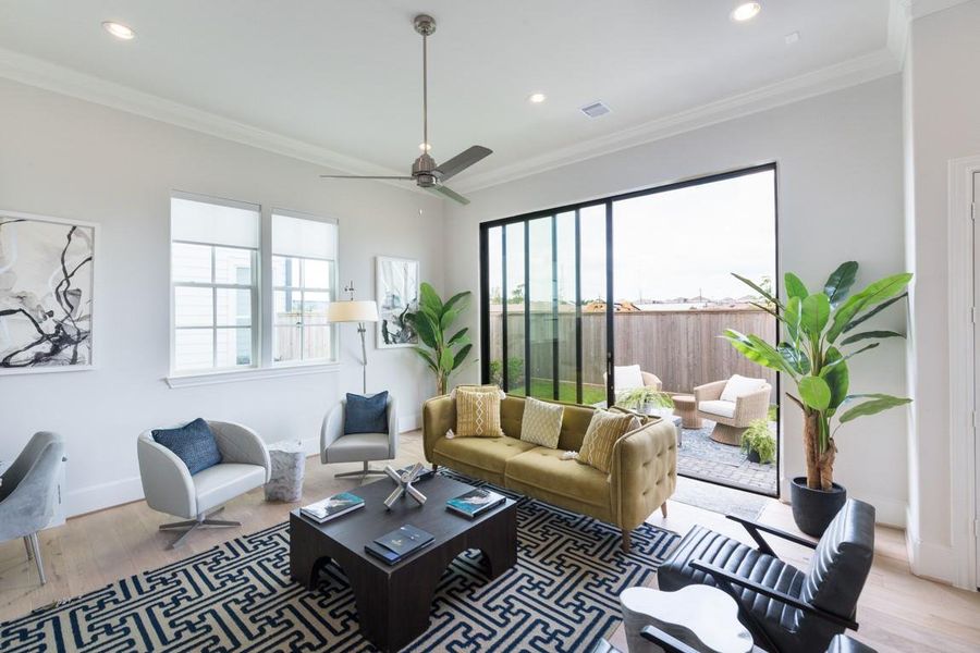 glass sliding doors lead to spacious backyard similar to this photo