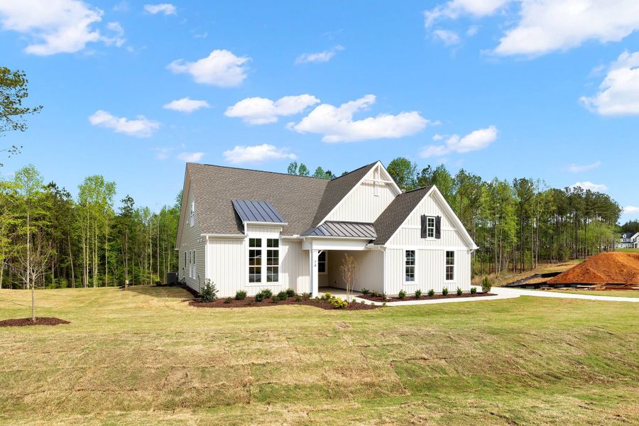 Representative exterior photo of a completed home built from the The Bradley by RobuckHomes in Baylee Ridge, Selma, NC (Image 64). Representative exterior photo of a completed home built from the The Bradley by RobuckHomes in Baylee Ridge, Selma, NC (Image 64).