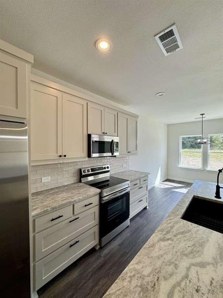 Furnished interior view inside a new home in , Trenton (Image 5).