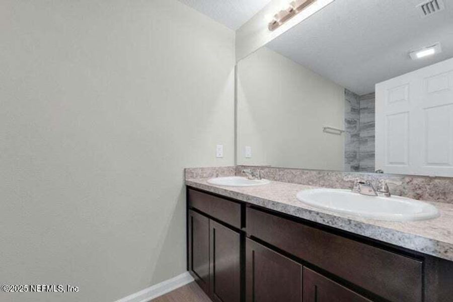 Furnished interior view inside a new home in , Jacksonville (Image 12). Furnished interior view inside a new home in , Jacksonville (Image 12).