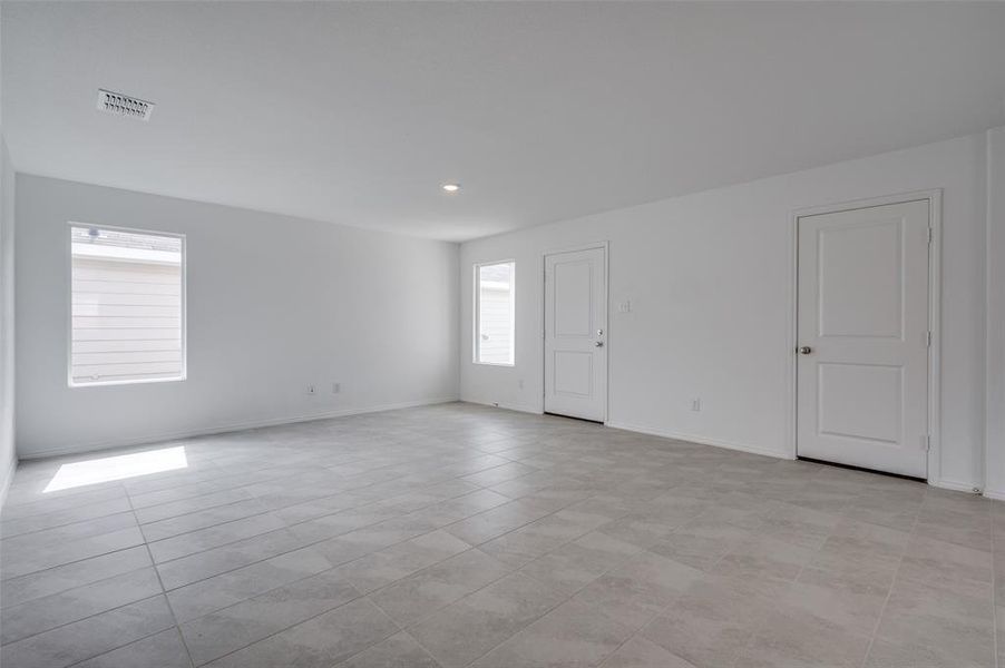 Spare room with light tile floors Spare room with light tile floors