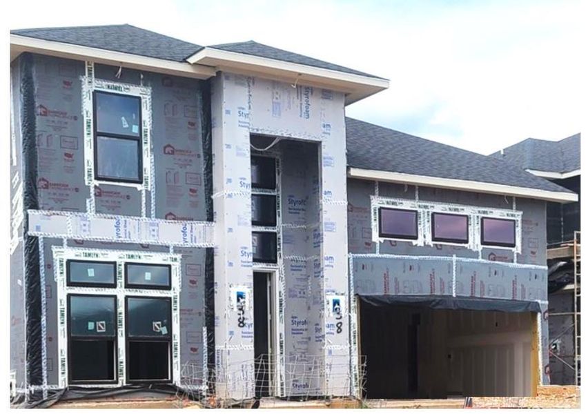 Exterior details and patio area of a home in Harvest Green - Final Opportunities, Richmond (Image 2). Exterior details and patio area of a home in Harvest Green - Final Opportunities, Richmond (Image 2).