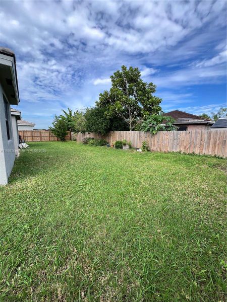 Exterior details and patio area of a home in , Homestead (Image 19). Exterior details and patio area of a home in , Homestead (Image 19).