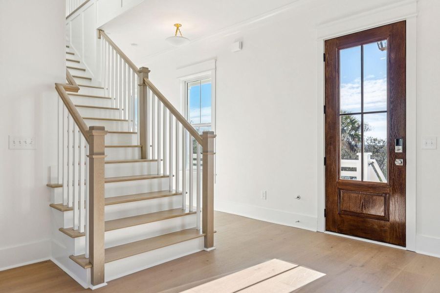 Spacious, unfurnished interior of a new home in Overlook at Copahee Sound, Awendaw (Image 54).