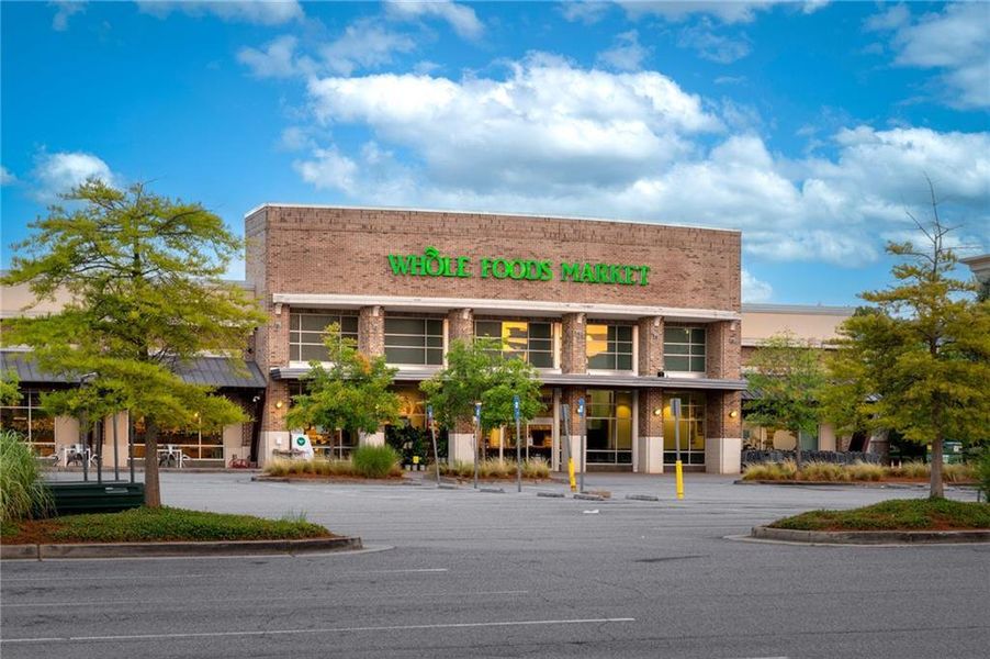 Front exterior of a new home in Echo at Crabapple, Milton, GA, highlighting curb appeal (Image 26). Front exterior of a new home in Echo at Crabapple, Milton, GA, highlighting curb appeal (Image 26).