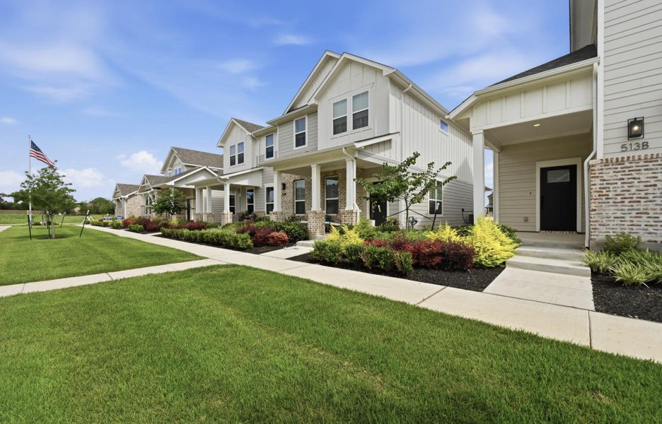 Front exterior of a new home in , Buda, TX, highlighting curb appeal (Image 22).