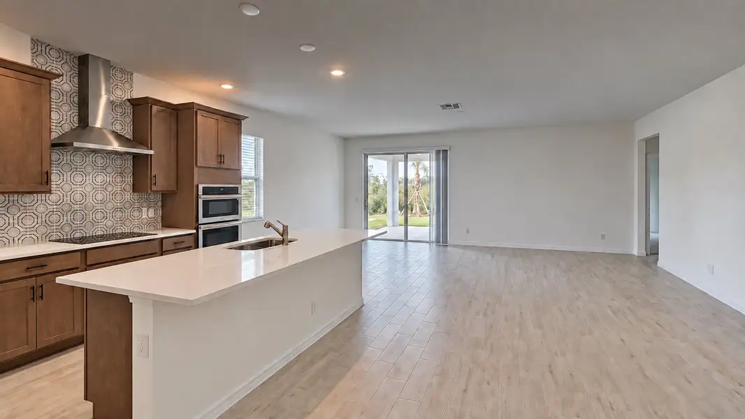 Furnished interior view inside a new home in Trinity Gardens, Deland (Image 4).