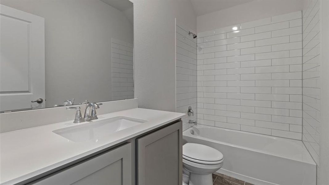 Full bathroom featuring bathtub / shower combination and vanity