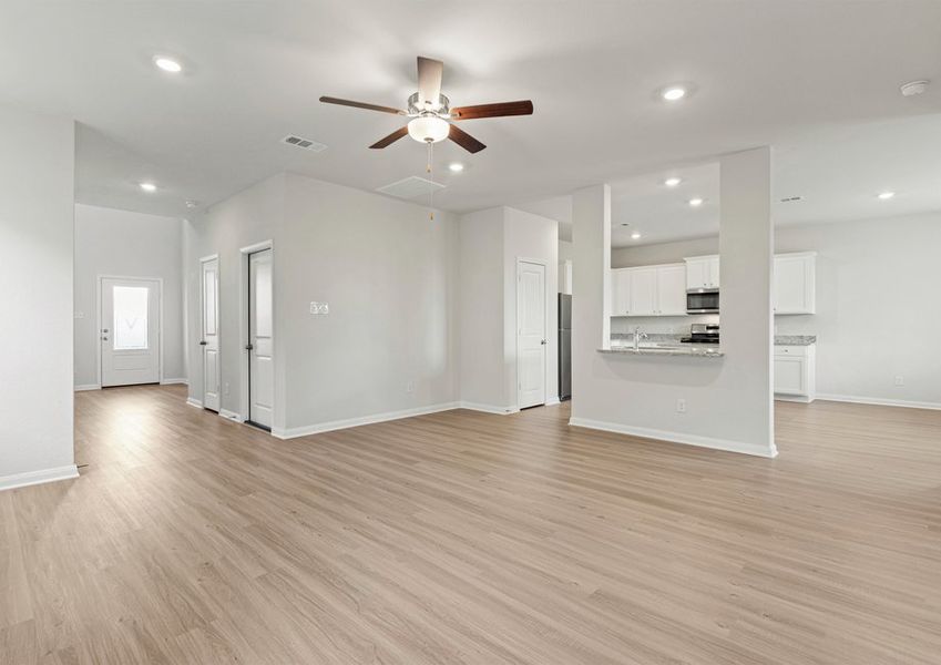 Family room with an adjoining kitchen Family room with an adjoining kitchen