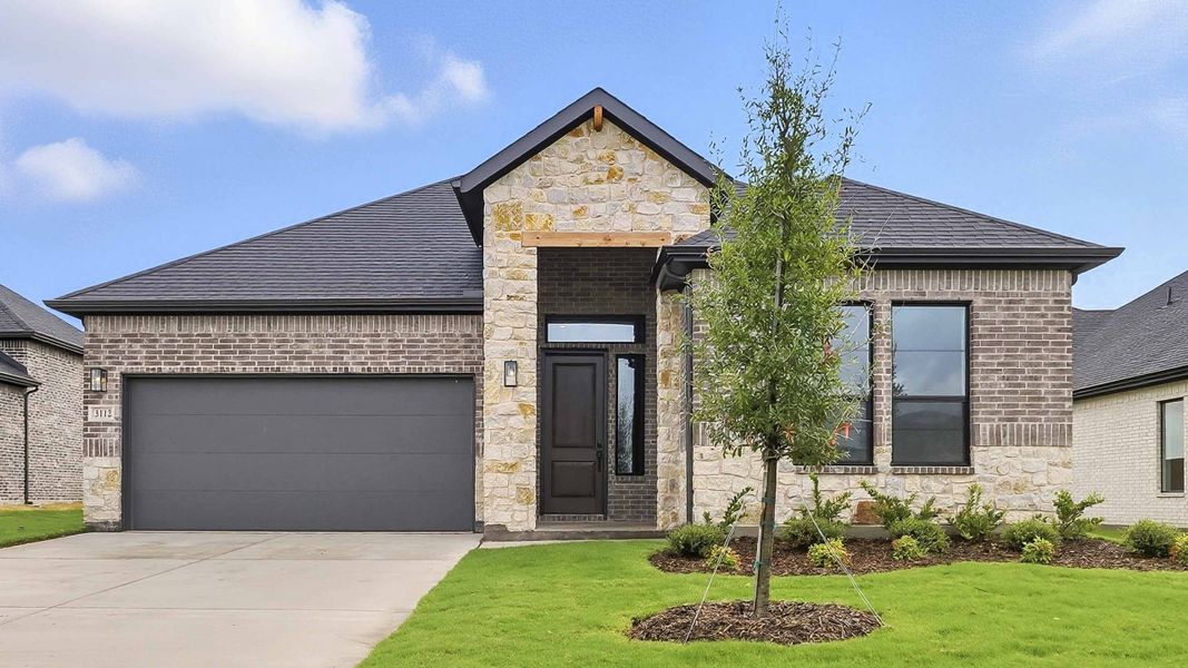 Front exterior of a new home in Clearview Ranch, Royse City, TX, highlighting curb appeal (Image 1). Front exterior of a new home in Clearview Ranch, Royse City, TX, highlighting curb appeal (Image 1).