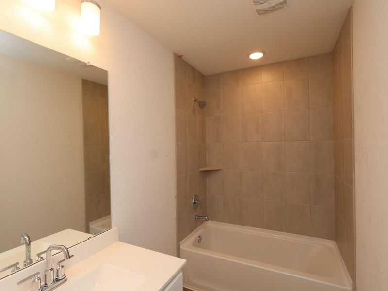 Furnished interior view inside a new home in Sorella, Tomball (Image 7).