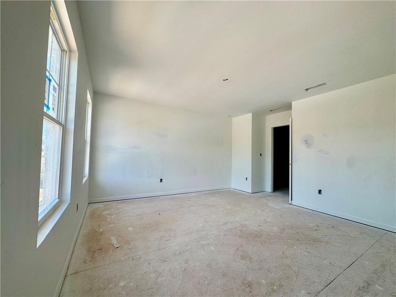 In-progress construction of a new home in Eastlyn Crossing, Flowery Branch, GA (Image 9).