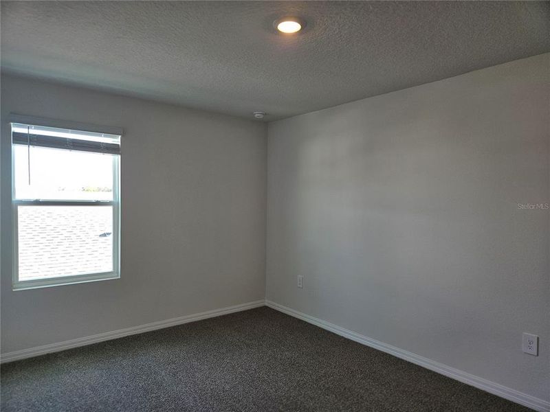 Spacious, unfurnished interior of a new home in Lawson Dunes - Signature Series, Haines City (Image 39).