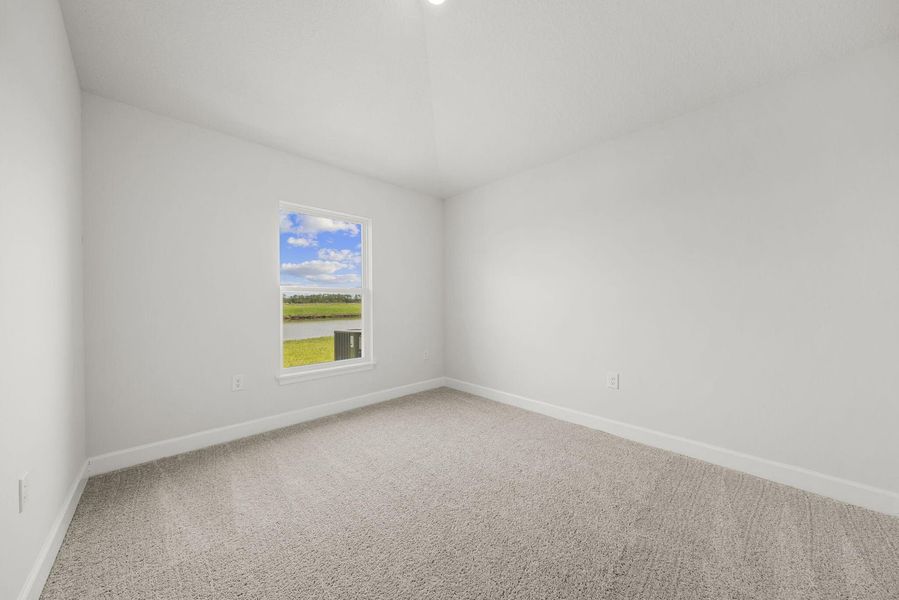 Representative unfurnished interior of a home built from the 1635 by Adams Homes in Winding Oaks, Weeki Wachee (Image 38).