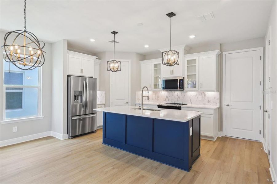 Furnished interior view inside a new home in Silverleaf Reserve Bungalows, Winter Garden (Image 9).