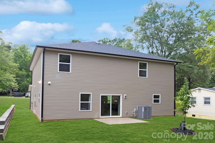Exterior details and patio area of a home in , Huntersville (Image 4).