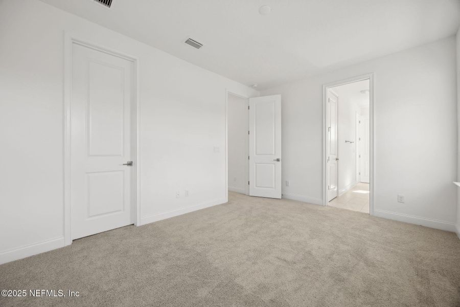 Spacious, unfurnished interior of a new home in Amelia National, Fernandina Beach (Image 19).