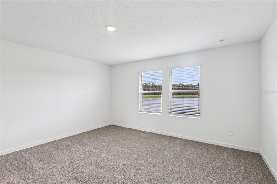 Spacious, unfurnished interior of a new home in Flagler Village - Signature Series, Palm Coast (Image 29). Spacious, unfurnished interior of a new home in Flagler Village - Signature Series, Palm Coast (Image 29).