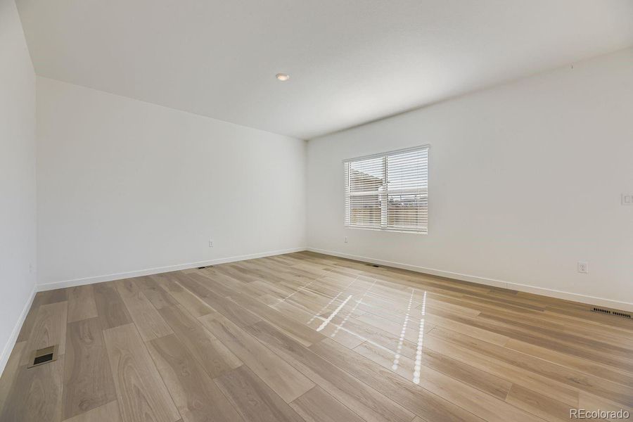 Spacious, unfurnished interior of a new home in Eastcreek Farm: The Camden Collection, Thornton (Image 9).