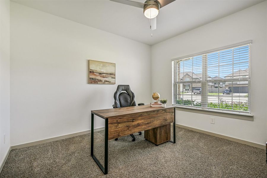 Positioned at the front of the home, this versatile bedroom offers a large window, ceiling fan and generous proportions, making it equally well suited for use as a private home office or study. Positioned at the front of the home, this versatile bedroom offers a large window, ceiling fan and generous proportions, making it equally well suited for use as a private home office or study.