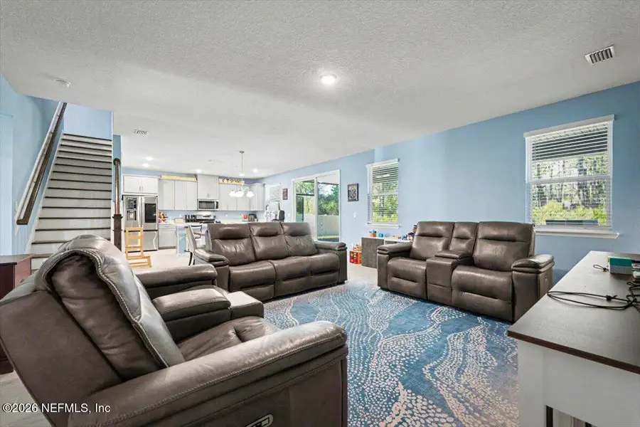Furnished interior view inside a new home in RiverTown - Settlement, St. Johns (Image 9).