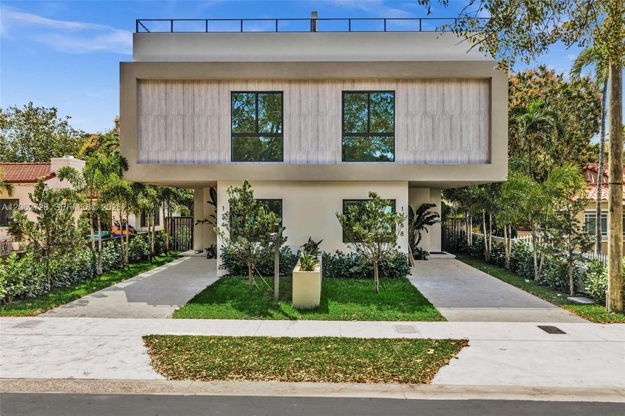 Front exterior of a new home in , Miami, FL, highlighting curb appeal (Image 2). Front exterior of a new home in , Miami, FL, highlighting curb appeal (Image 2).