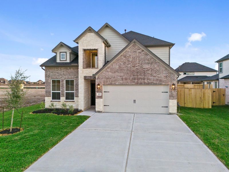 Front exterior of a new home in Briarwood Crossing, Rosenberg, TX, highlighting curb appeal (Image 21).