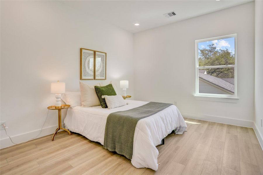 The 10x11 SF 3rd bedroom has a large wall closet.