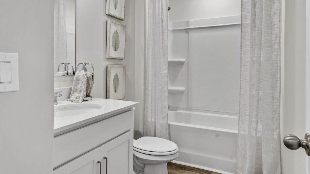 Representative furnished interior of a home built from the Freeport by D.R. Horton in Bailey Park, Fayetteville (Image 8).