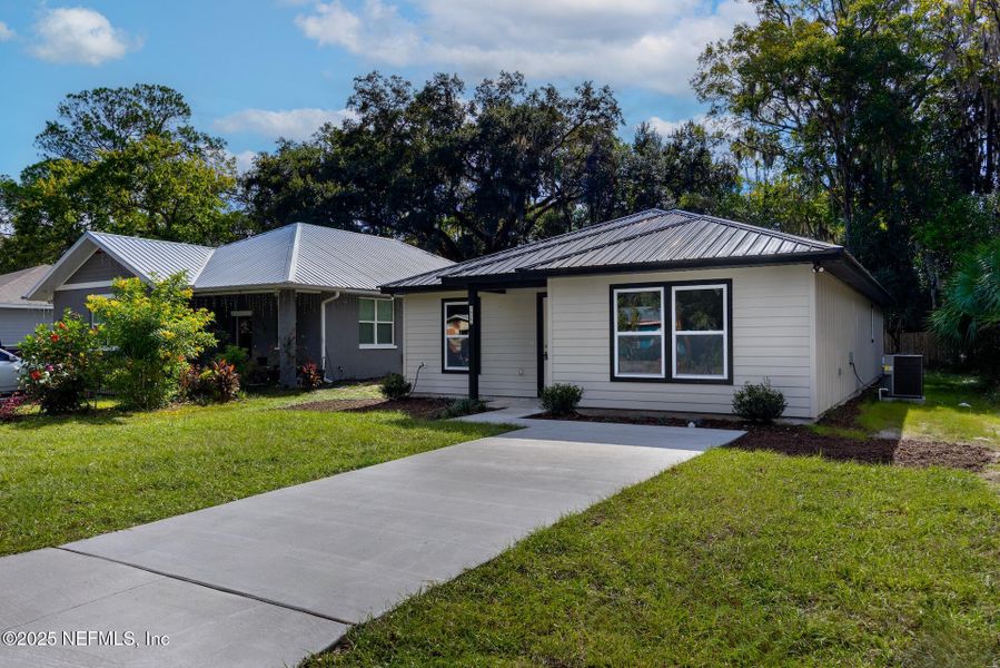 Front exterior of a new home in , Gainesville, FL, highlighting curb appeal (Image 1). Front exterior of a new home in , Gainesville, FL, highlighting curb appeal (Image 1).