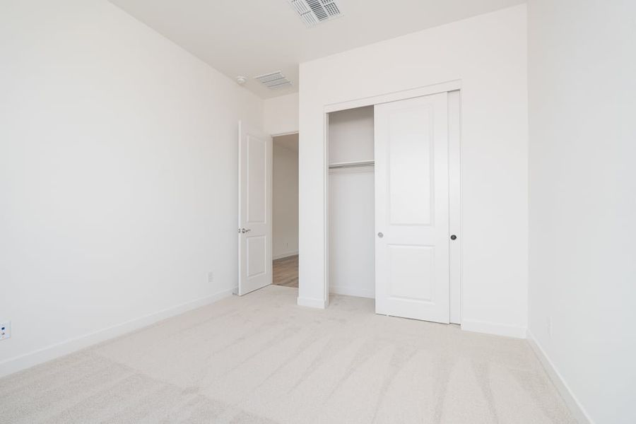 Spacious, unfurnished interior of a new home in Revana at Soleo, San Tan Valley (Image 31).