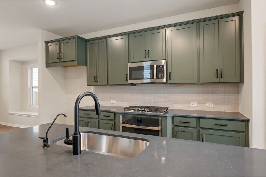 Representative furnished interior of a home built from the Robin by Ashton Woods in The Cottages at Lariat, Liberty Hill (Image 8). Representative furnished interior of a home built from the Robin by Ashton Woods in The Cottages at Lariat, Liberty Hill (Image 8).